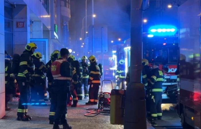 An electric car caught fire at night in an underground garage in the center of Prague